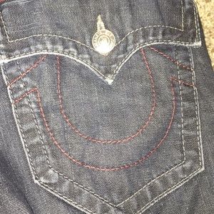 Red and black true religions jeans